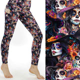 Colourful Day of the Dead leggings featuring sugar skull women with floral crowns and hats on a black background