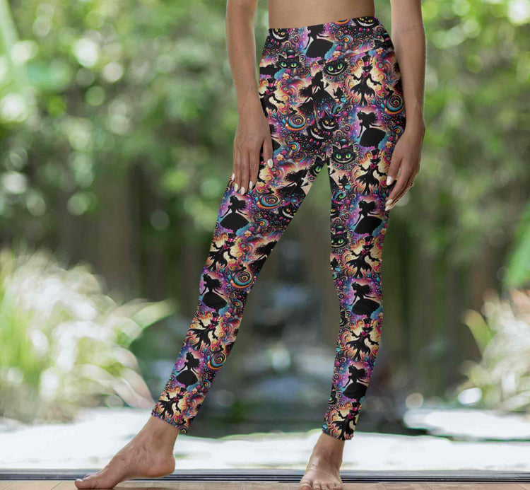 mockup of lady wearing Wonderland-themed leggings with tea cups, white rabbits, checkered patterns and surreal elements in rich, moody colours.