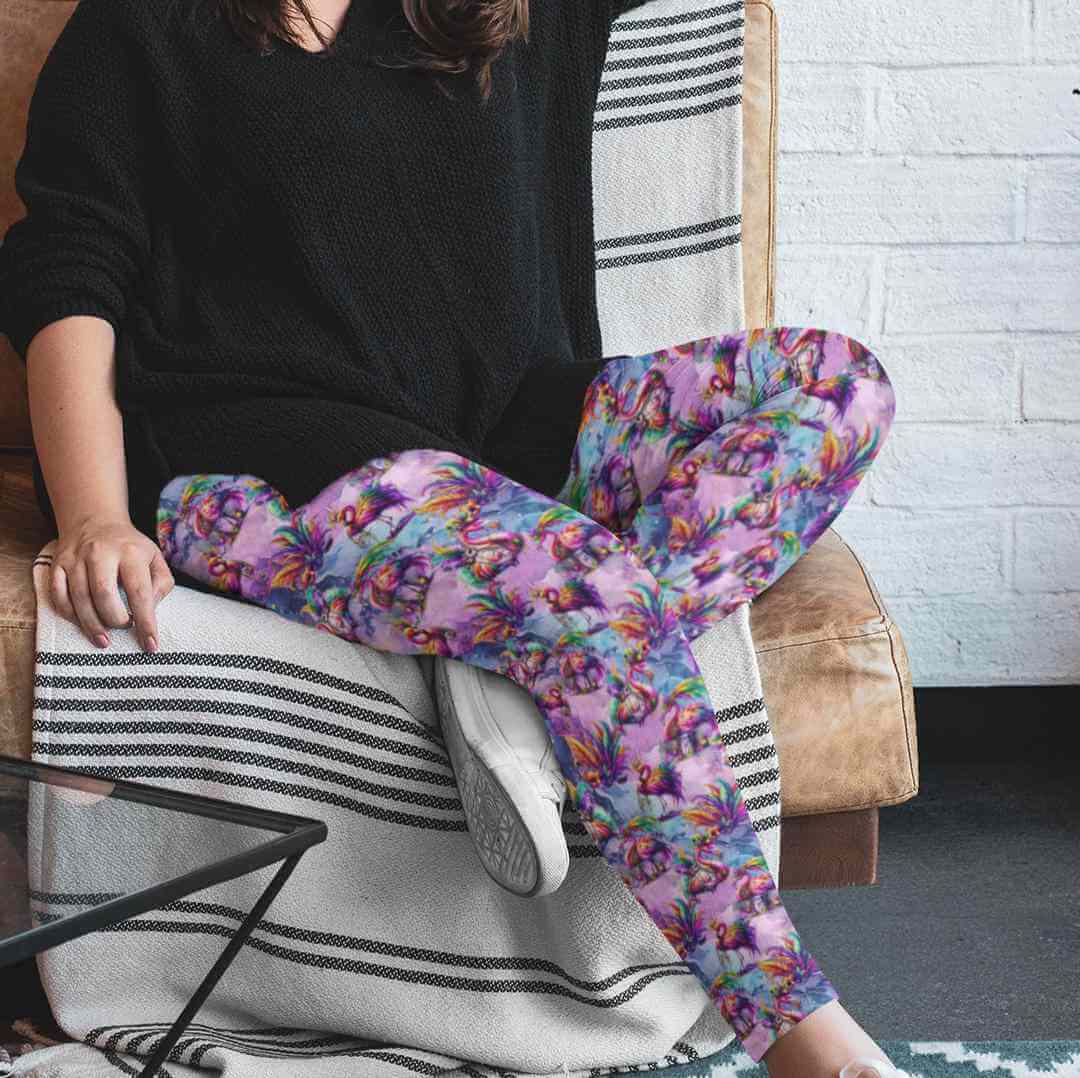 Flamingo-in-a-flock-of-seagulls-plus-size-leggings-mockup-featuring-a-woman-sitting-on-a-couch