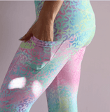 girl wearing pastel rainbow leopard print leggings