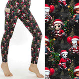 Black leggings with chibi-style horror characters Freddy, Jason, Michael, Pennywise and Chucky dressed as Santa with gold stars and glowing lights by Nikki Whoops Boutique.
