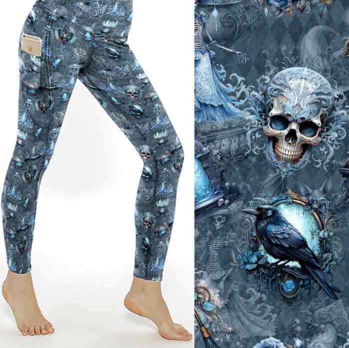 mockup of Blue gothic leggings with skeleton brides, crows, potion bottles, bats and ornate Victorian elements on a patterned background.