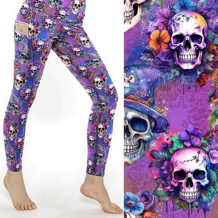 Mockup of 'Til Death Do We Party Skull Leggings with colorful skulls, flowers, and wizard hats on a purple background; close-up shows vivid details by Nikki Whoops Boutique.