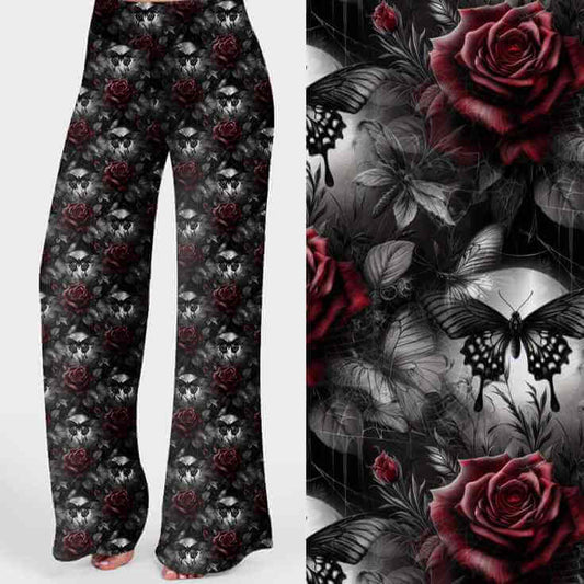 Blood Moon Butterflies print lounge pants with red roses, black butterflies and a dark grey floral background.