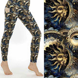 Celestial Secrets full-length leggings featuring celestial sun and moon faces, all-seeing eyes, stars and mystical astrology-inspired artwork in navy and gold tones.