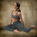 close-up-woman-in-a-yoga-pose-wearing-leggings-mockup-bringer-of-lightning-strangelings-leggings