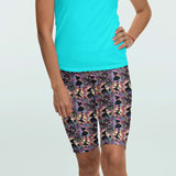 brightly coloured curiouser and curiouser alice in wonderland shorts with pockets