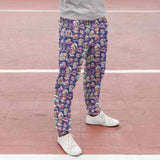 down-the-rabbit-hole-alice-in-wonderland-sublimated-sweatpants-mockup-featuring-a-woman-at-a-running-track-cropped