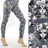 A pair of leggings featuring a monochrome illustration of La Catrina, with floral patterns and a Day of the Dead theme.