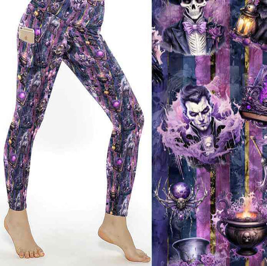 Purple patterned Halloween leggings worn by a person on a white background, with a decorative panel featuring a gothic-themed design.