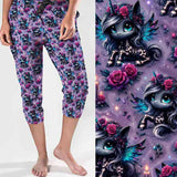 Happily Never After Unicorn Capri Joggers With Pockets by Nikki Whoops Boutique, shown with a close-up of the print.