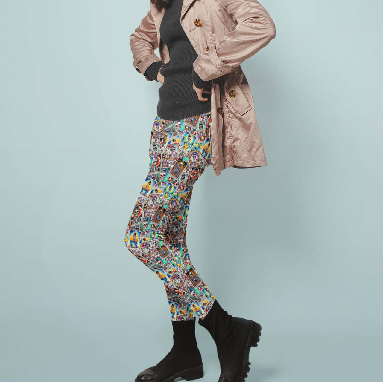 girl wearing Tarot card skull leggings with stacks of books, handwritten notes and reading accessories on a grungy illustrated background.