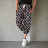 mockup of girl wearing of Rebel Rabbits capri joggers featuring gothic Easter rabbits