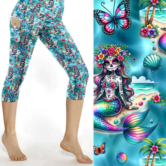 Capri leggings featuring swirling ocean-inspired patterns in shades of teal, blue, and silver with a shimmering underwater effect.