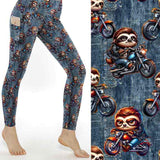 Denim leggings with sloth characters riding motorcycles on a blue denim pattern.