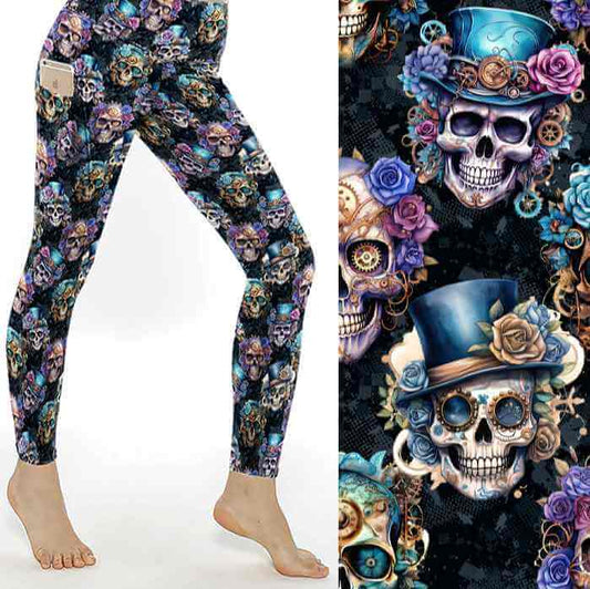 A pair of leggings featuring a steampunk skull design with colorful skulls adorned with top hats and roses, set against a black background.