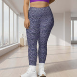 Plus size girl wearing leopard leggings with tones of violet and mauve with a black and silver leopard print by Nikki Whoops Boutique.