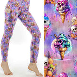Wicked Sweet leggings with skulls in ice cream cones on a pastel pink and purple background by Nikki Whoops Boutique.