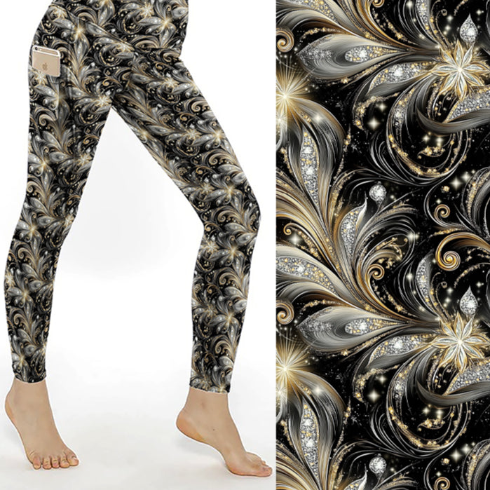 Leggings with intricate black and gold pattern on a white background