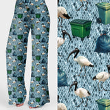 Women's wide leg bin chicken lounge pants featuring Australian ibis birds, wheelie bins and rubbish bags on a blue patterned background.