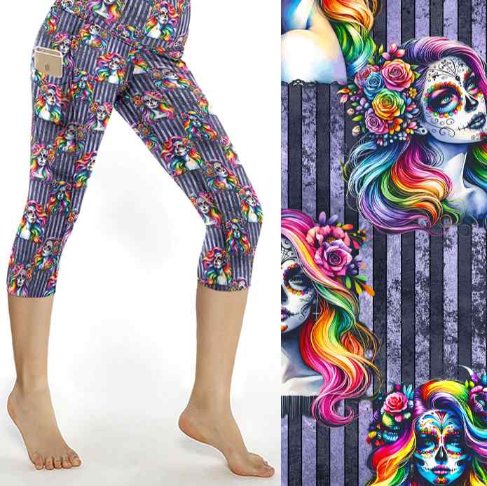 Girl With Kaleidoscope Hair leggings. La Catrina images with vibrant rainbow coloured hair on a grungy purple striped background.