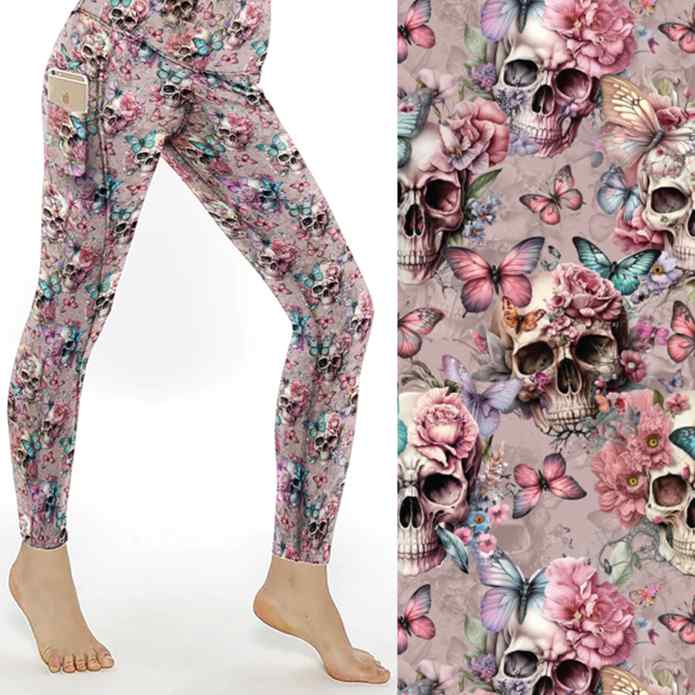 Dusty pink leggings featuring skulls, flowers, and pastel butterflies in soft shades of pink, lilac, and blue on a romantic floral background.
