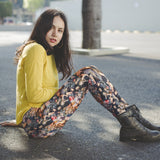 buffy-the-vampire-slayer-leggings-woman-sitting-on-the-street-wearing-leggings-and-a-yellow-sweater