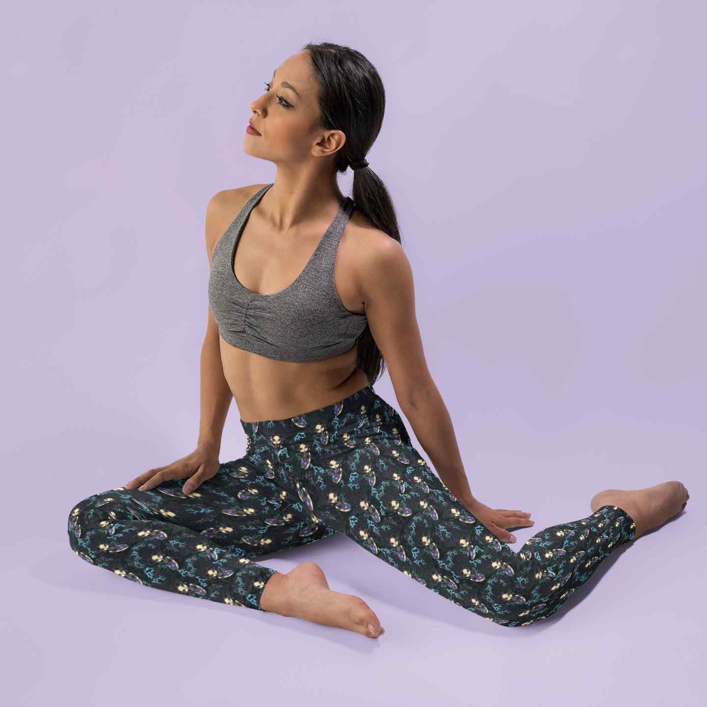 close-up-woman-in-a-yoga-pose-wearing-leggings-mockup-bringer-of-lightning-strangelings-leggings