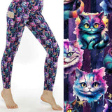 Colourful cosmic cat leggings featuring bright neon kittens with starry background in purple, blue and pink tones