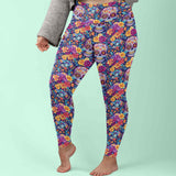 Woman wearing Bright Side of the Grave full length leggings with pockets by Nikki Whoops Boutique.