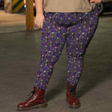 dead-ringer-mockup-of-a-red-headed-girl-wearing-purple-skull-plus-size-leggings