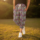 Person wearing colorful care bear capri jogger  pants outside in afternoon sunlight
