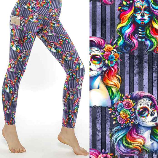 stock image of Rainbow calavera leggings featuring a girl with flowing multicoloured hair and sugar skull face paint on a vibrant background.