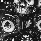 Cropped close-up of the Grin Reaper black and white cartoon-style sugar skull print pattern.