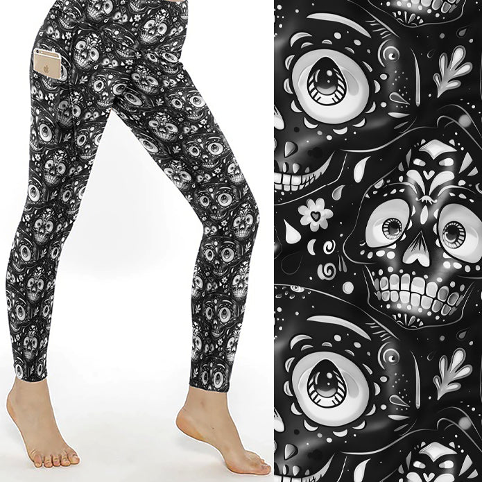 Grin Reaper Skull Print Leggings With Pockets featuring black and white cartoon-style sugar skulls on buttery-soft full-length leggings with deep side pockets.