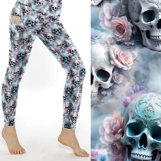 Leggings with pastel pink, lavender, and blue roses intertwined with detailed skull designs on a soft cloudy background.