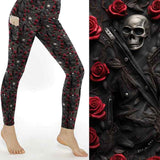 mock up of Gothic leggings with black leather texture, red roses, silver skulls and zippers entwined with vines.