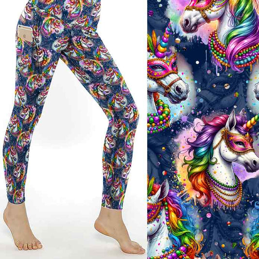 Leggings with a colorful unicorn pattern, featuring masquerade masks and beads on a dark background; close-up shown.