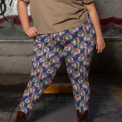 Person wearing colorful unicorn-themed leggings and brown boots, standing in an urban setting with graffiti.