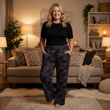 lady standing in lounge room wearing midnight monarchs butterfly lounge pants