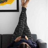 Heart print leggings featuring sketchy, torn-paper-style hearts in soft pinks and greys with a grungy distressed finish. on plus size woman