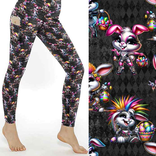 Rebel Rabbits Easter leggings featuring gothic lady bunnies with rainbow hair, mohawks. Wearing studded leather jackets, and boots . Holding baskets of brightly coloured Easter eggs