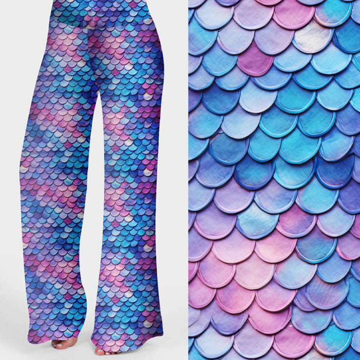 Women's mermaid scale lounge pants featuring pastel blue, purple and pink fish scales with a shimmering ocean-inspired design.