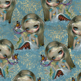 Illustration of a fairy with blue eyes and blonde hair on a blue background with gold patterns.