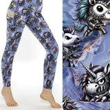 Leggings with unicorn and dragon design on a white background