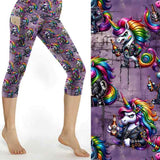 punk unicorns with rainbow hair on a purple grunge background capri leggings