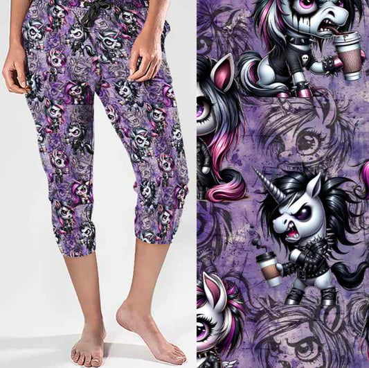 Capri joggers with a punk unicorn pattern on purple; close-up shows unicorns holding coffee with edgy style.