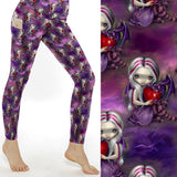 Valentine Dragonling Strangelings Leggings With Pockets featuring a gothic fantasy doll holding a red heart with a baby dragon on purple full-length buttery-soft leggings with side pockets.