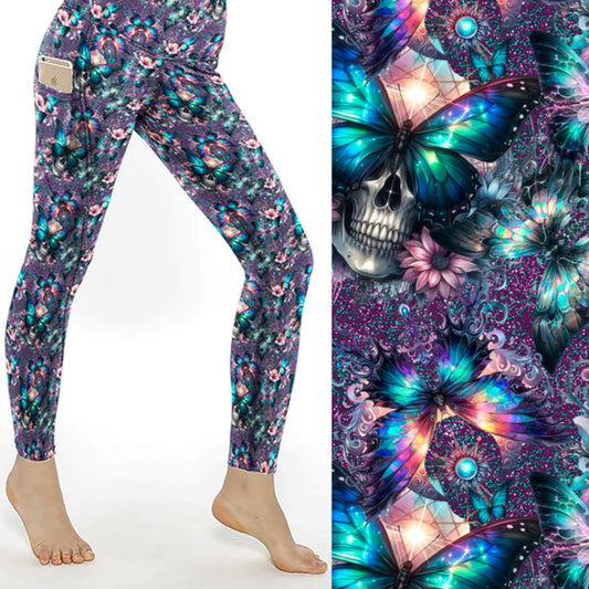 Leggings with galaxy background, iridescent butterflies, flowers, and skulls in vivid jewel tones.
